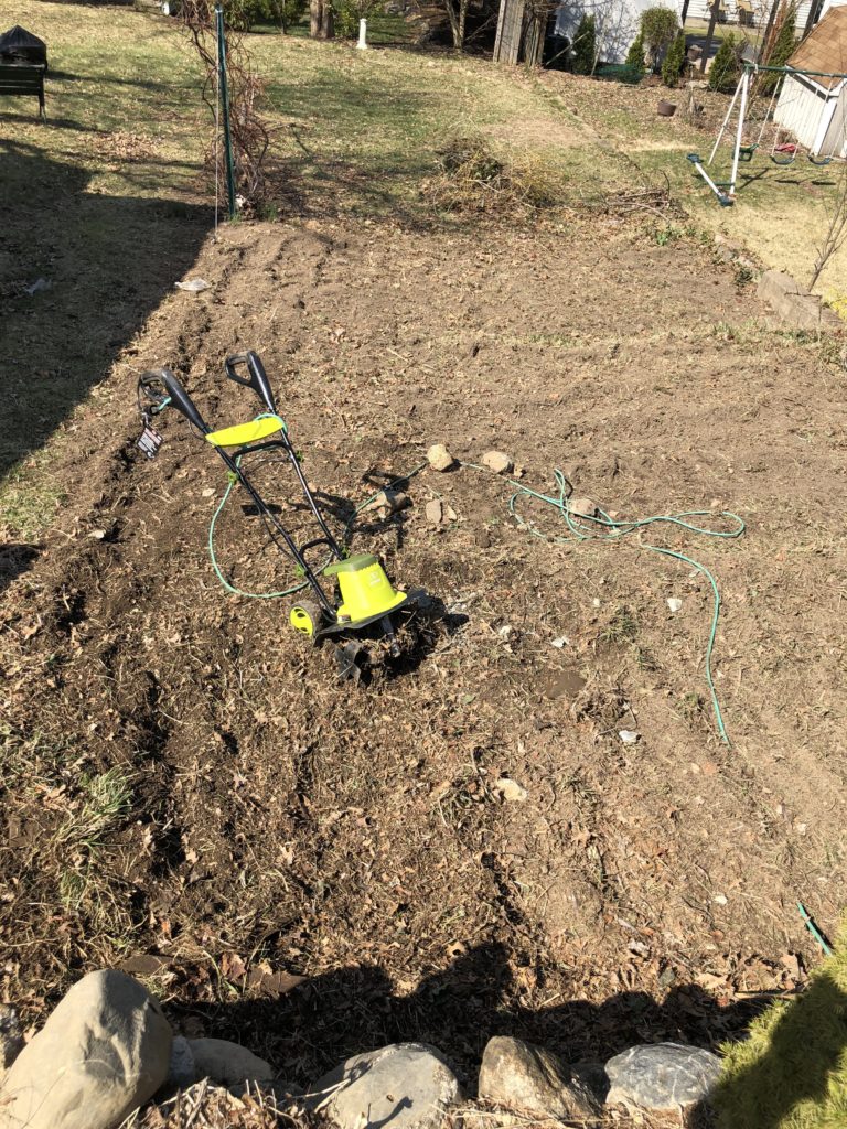 digging up a section of lawn with a cultivator is a great way to get dirty